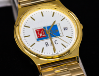 K10 - MEN'S GOLD WATCH W/ BAC LOGO AND EXPANDABLE WRISTBAND